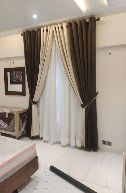 Beige Eyelet Curtains In Dubai Apartment