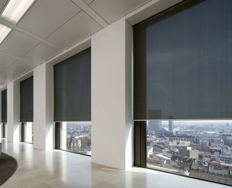 Dark grey commercial window roller blinds