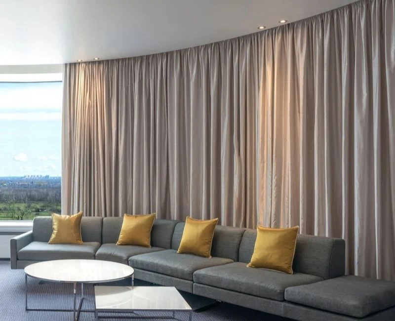 Elegant curved tracking soundproof curtains Dubai