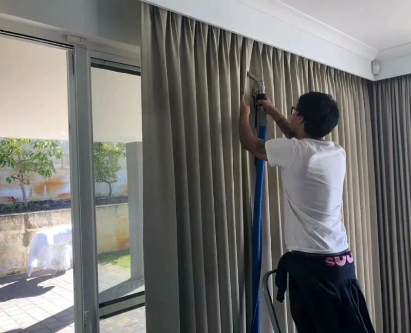 Professional steamer used after curtain installation