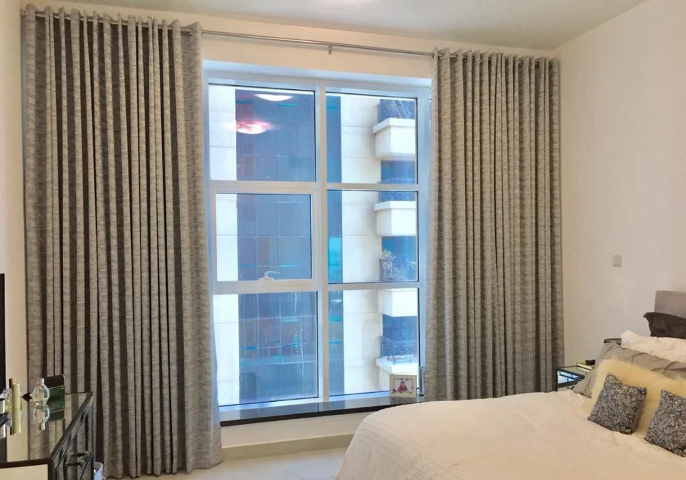 Textured grey eyelet linen curtains bedroom
