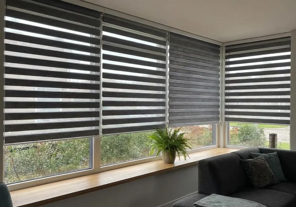 Charcoal grey zebra blinds corner window