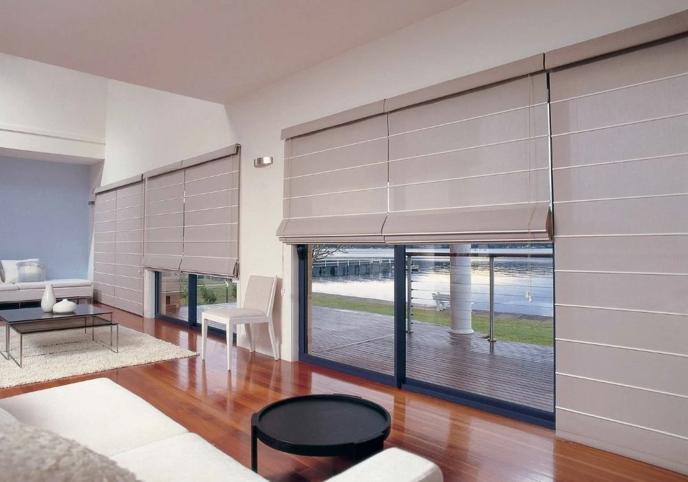 Soft beige motorized roman blinds patio