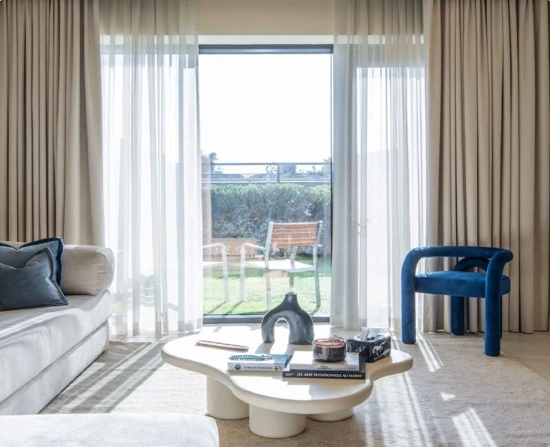 Modern neutral sheer curtains stylish patio lounge