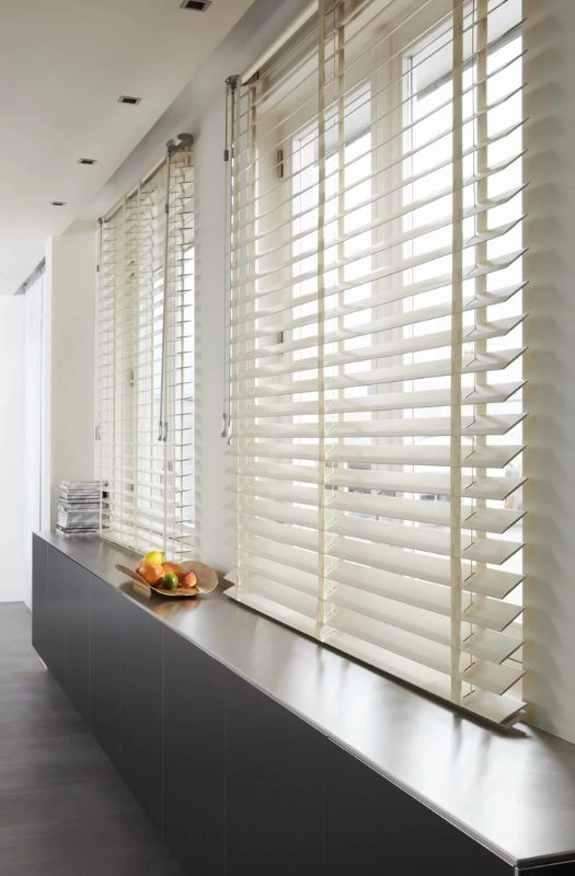 Off white wooden blinds window sill