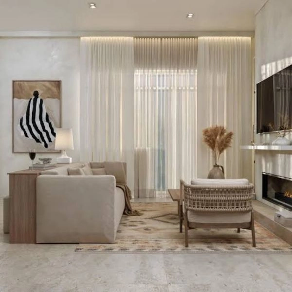 Premium sheer curtains behind luxury sofa Dubai
