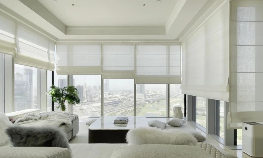 White sheer roman blinds large windows