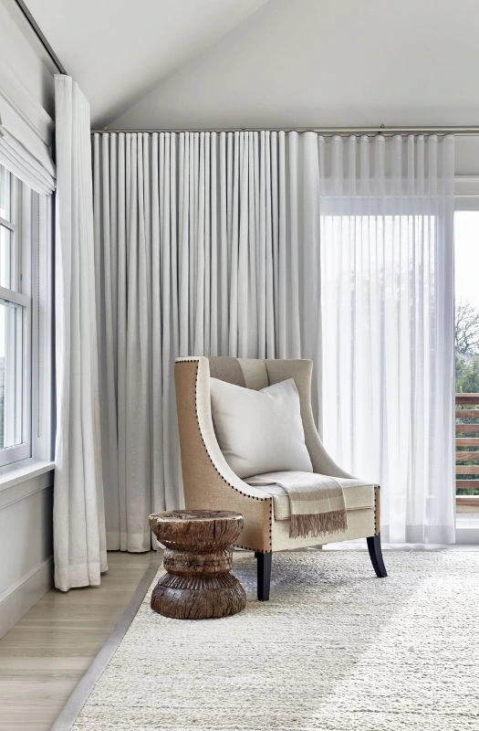 White sheer living room curtains armchair setup