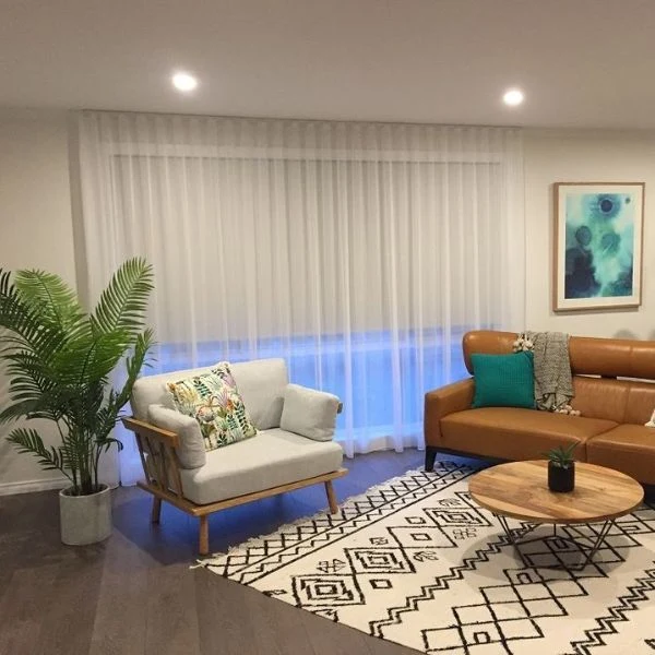 Minimalist white sheer curtains cozy home lounge