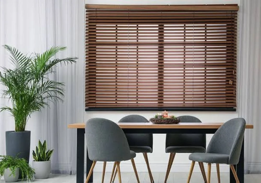 Dark wood Venetian blinds dining area
