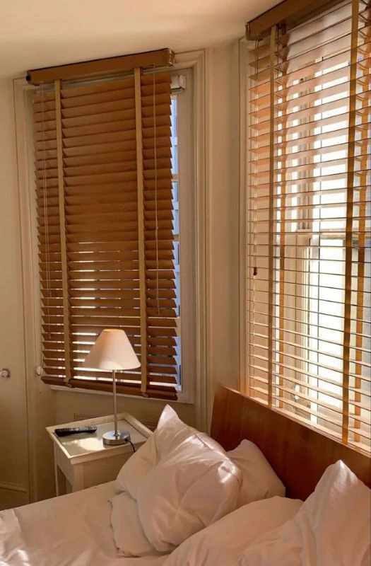 Natural timber wooden blinds bedroom window