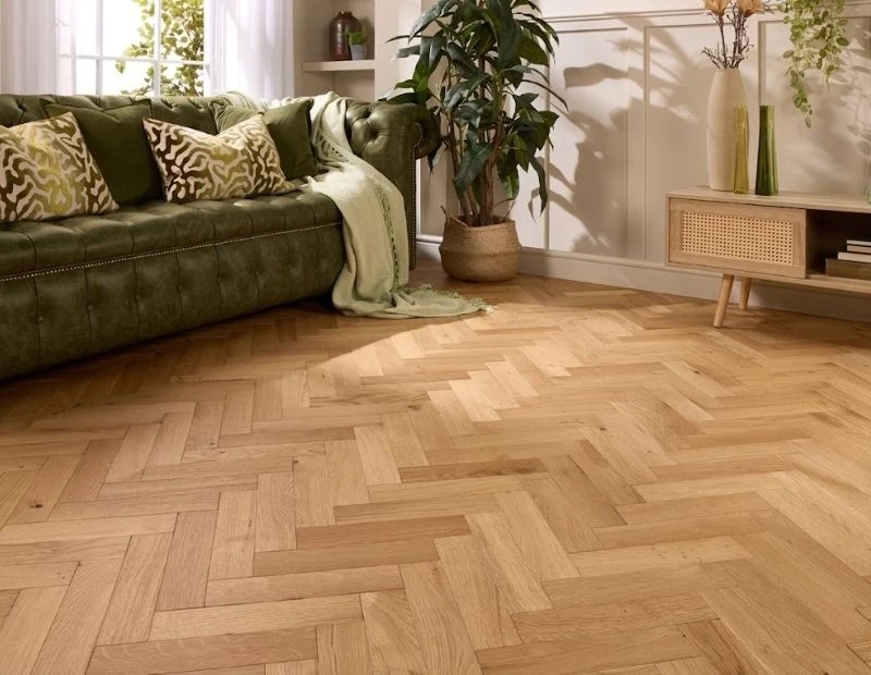 Cozy living room with light herringbone parquet