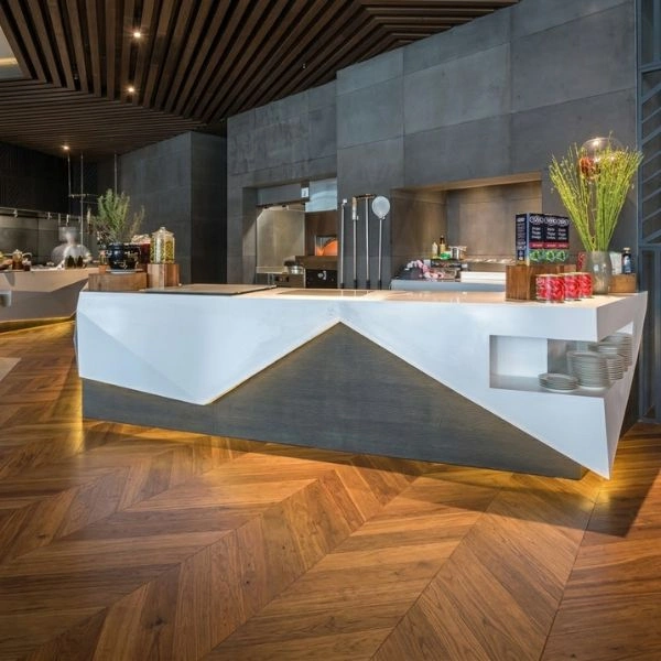 Hotel restaurant counter with chevron wood flooring