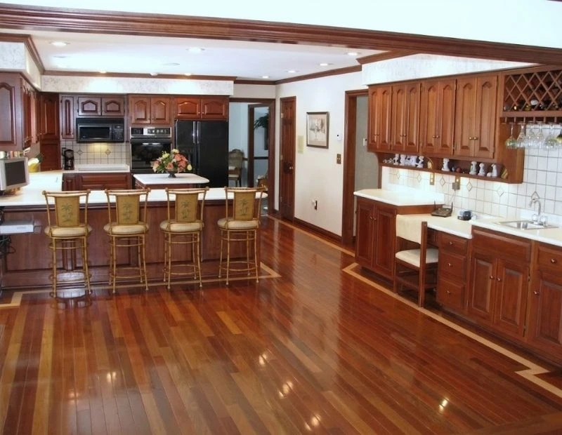 Traditional wooden kitchen with glossy flooring