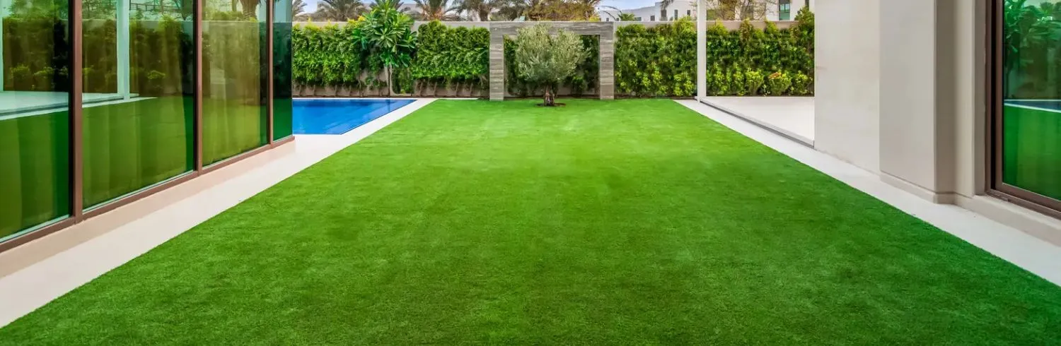 Luxury artificial grass lawn near Dubai pool