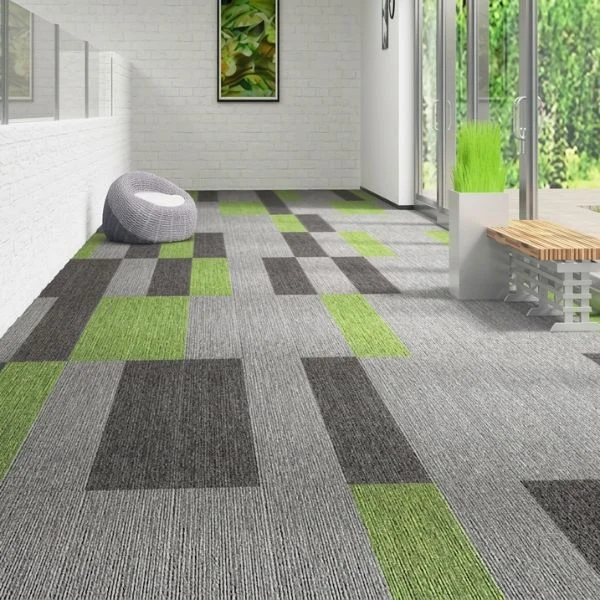 Grey green modular carpet tiles in corridor