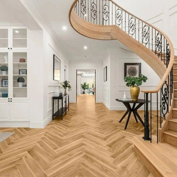 Luxury villa entryway with oak herringbone parquet