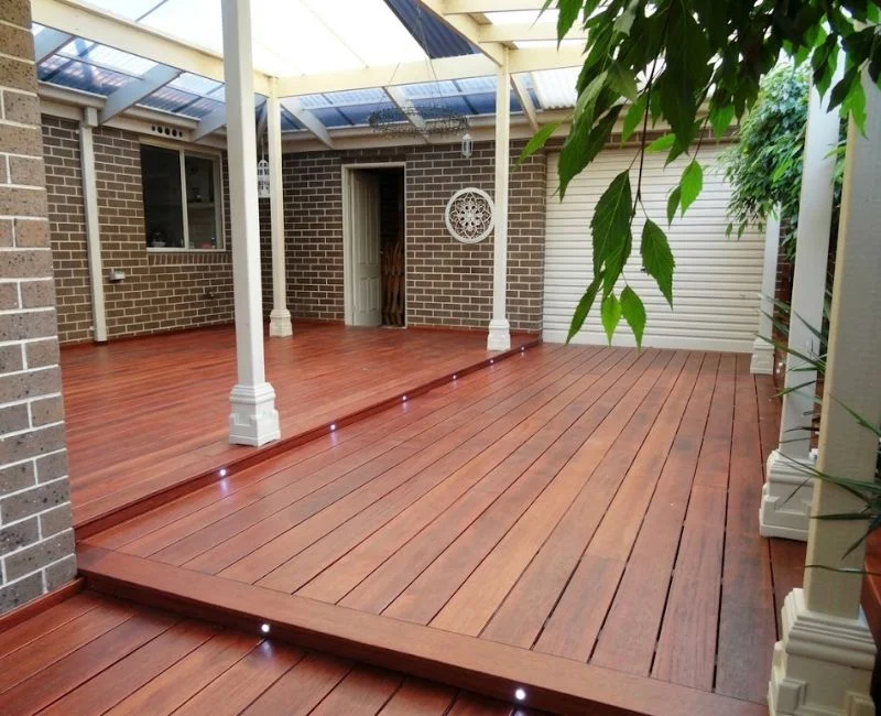 Covered outdoor patio with polished deck planks