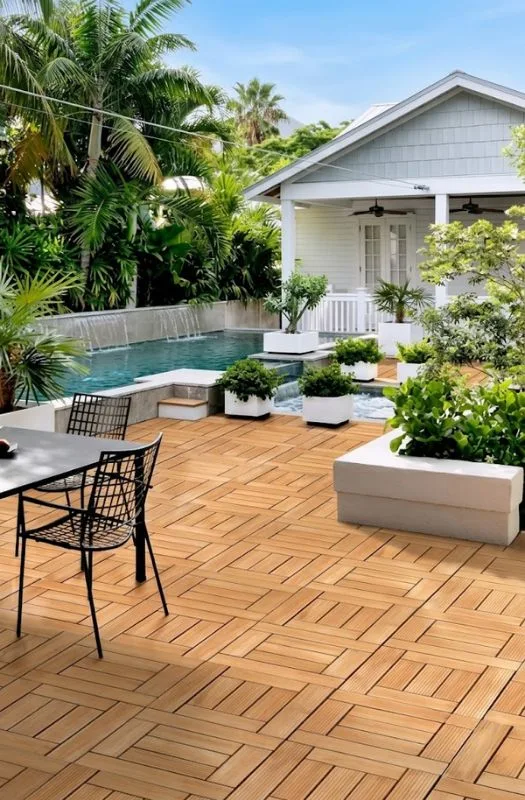 Outdoor pool patio with teak wood deck tiles