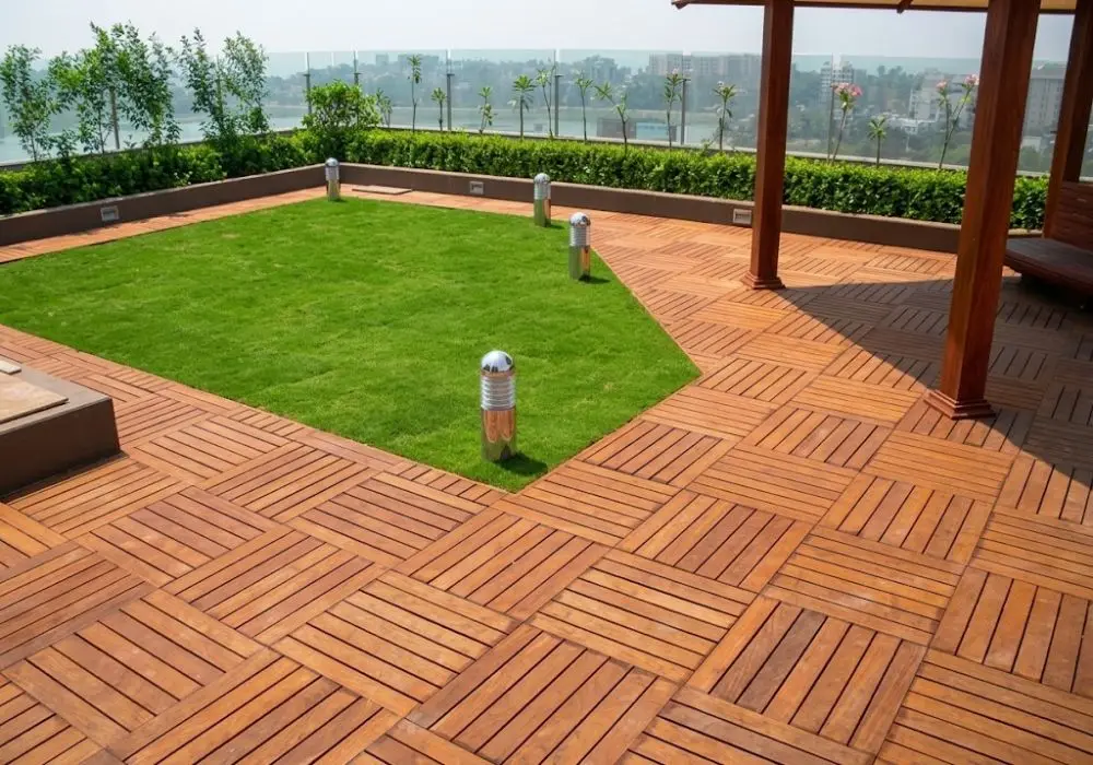 Rooftop garden with lawn and deck tiles