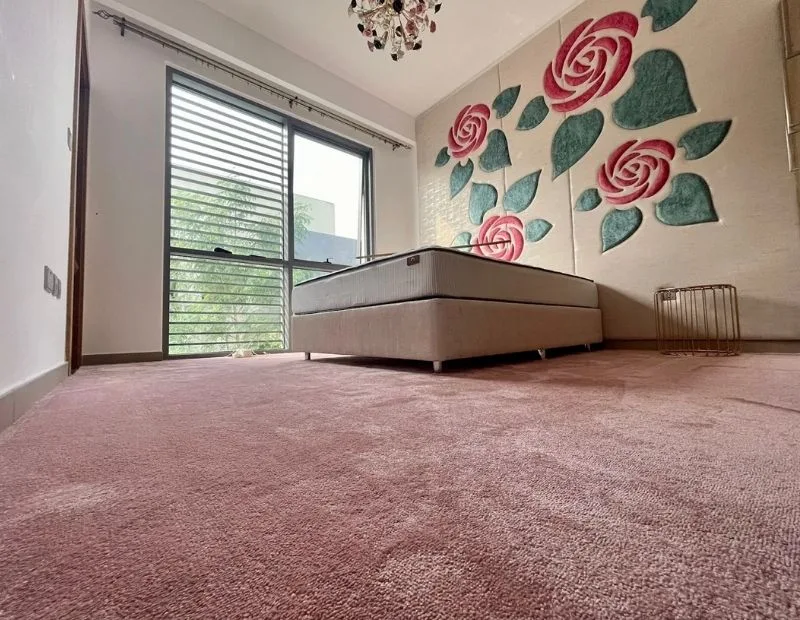 Luxury bedroom with soft pink carpet flooring