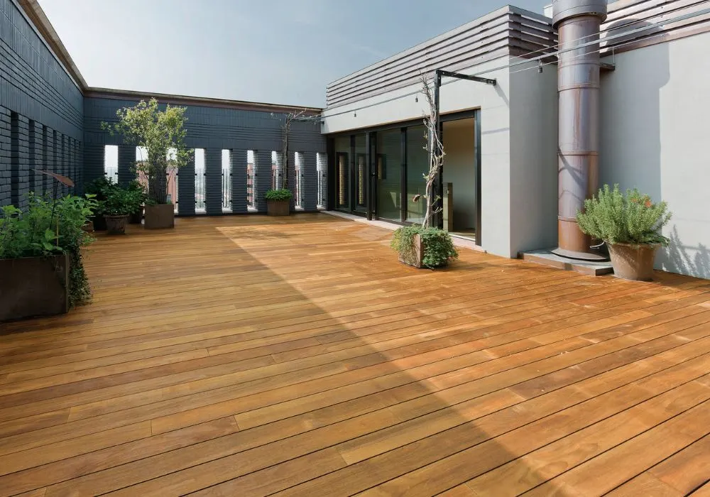 Large outdoor rooftop floor with teak wood deck