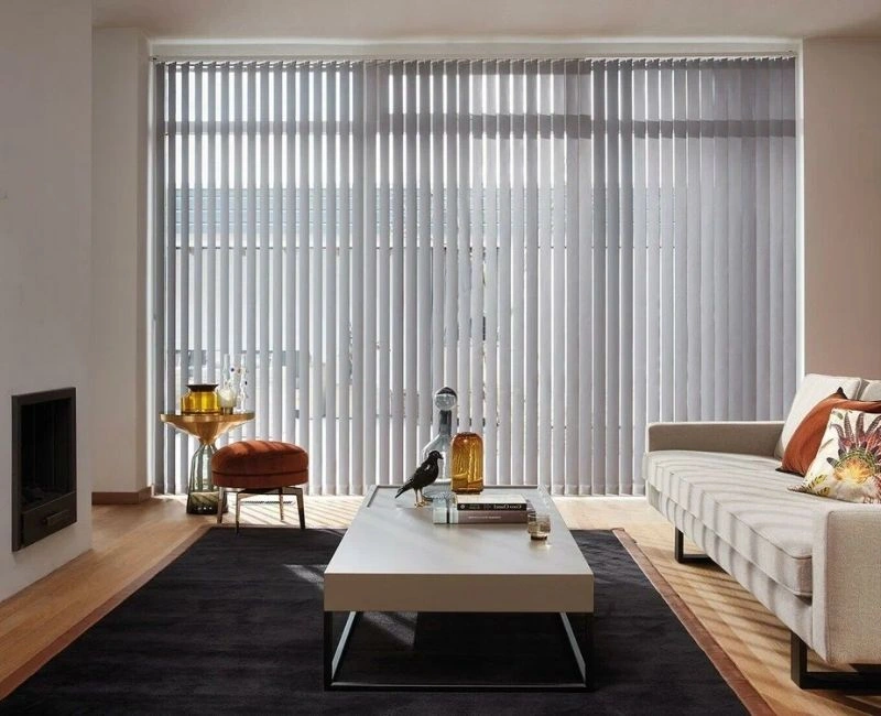 Light grey vertical blinds living room