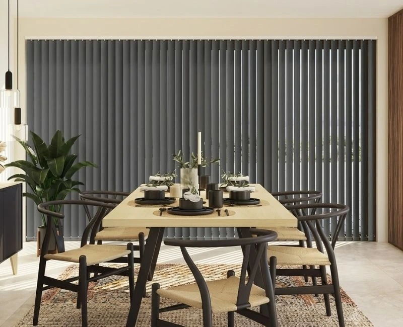 Charcoal grey vertical blinds dining space