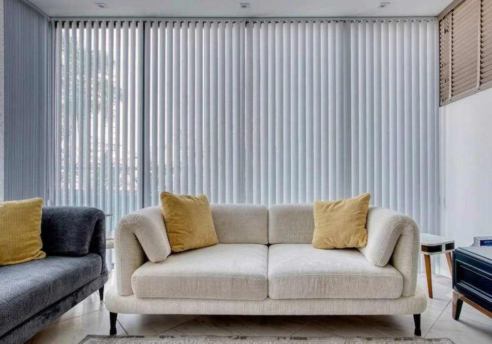 White vertical blinds modern living room