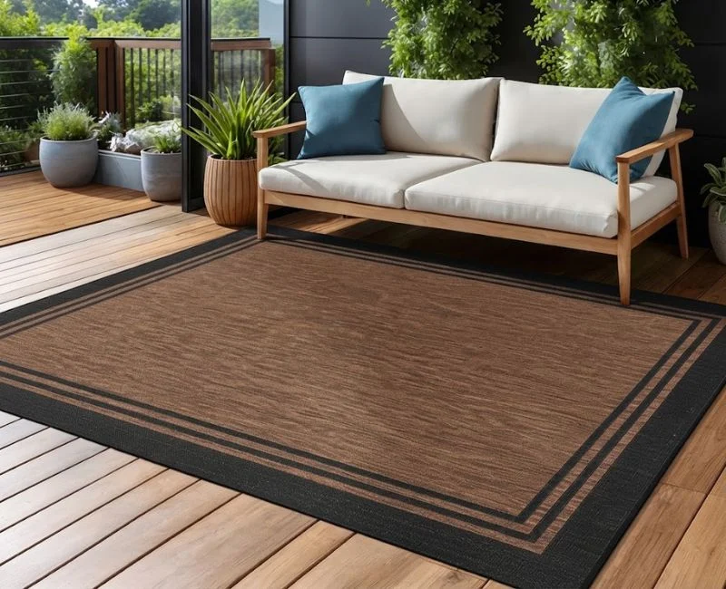 Brown and black bordered outdoor carpet