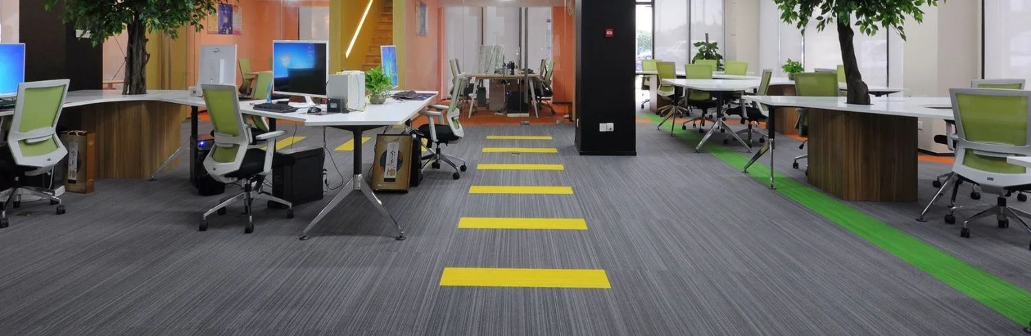 Grey linear office carpet with yellow stripe accents Dubai