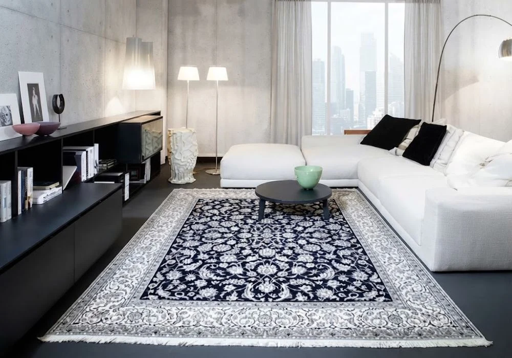 Navy blue silver Persian carpet in studio