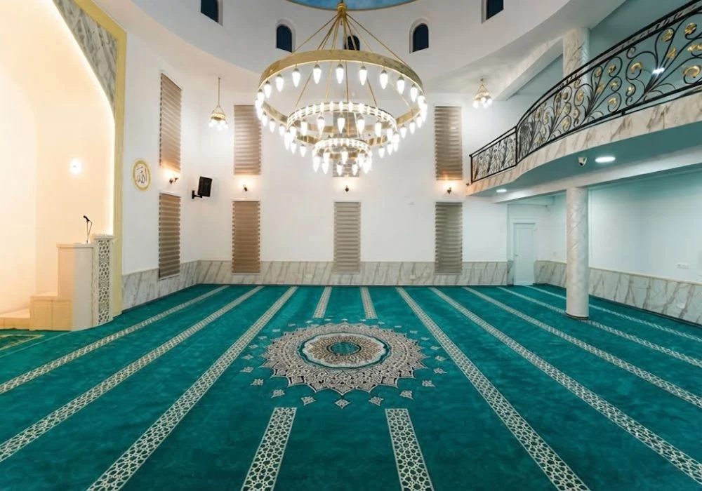 Turquoise mosque carpet with center medallion layout