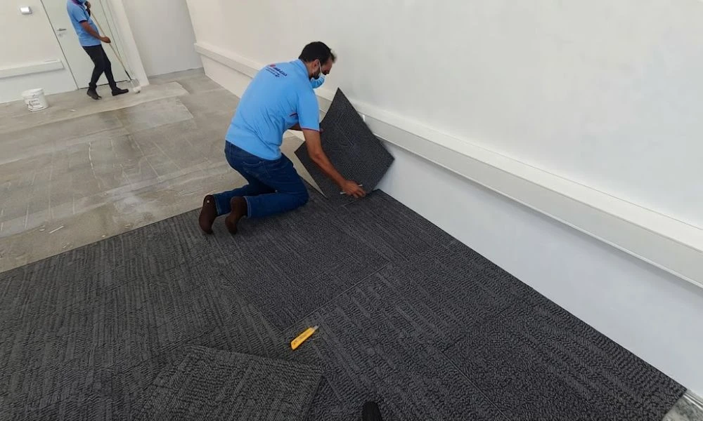 Professional Carpet Installation Experts Working