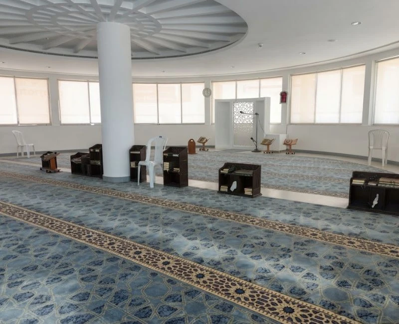 Light blue patterned mosque carpet in interior