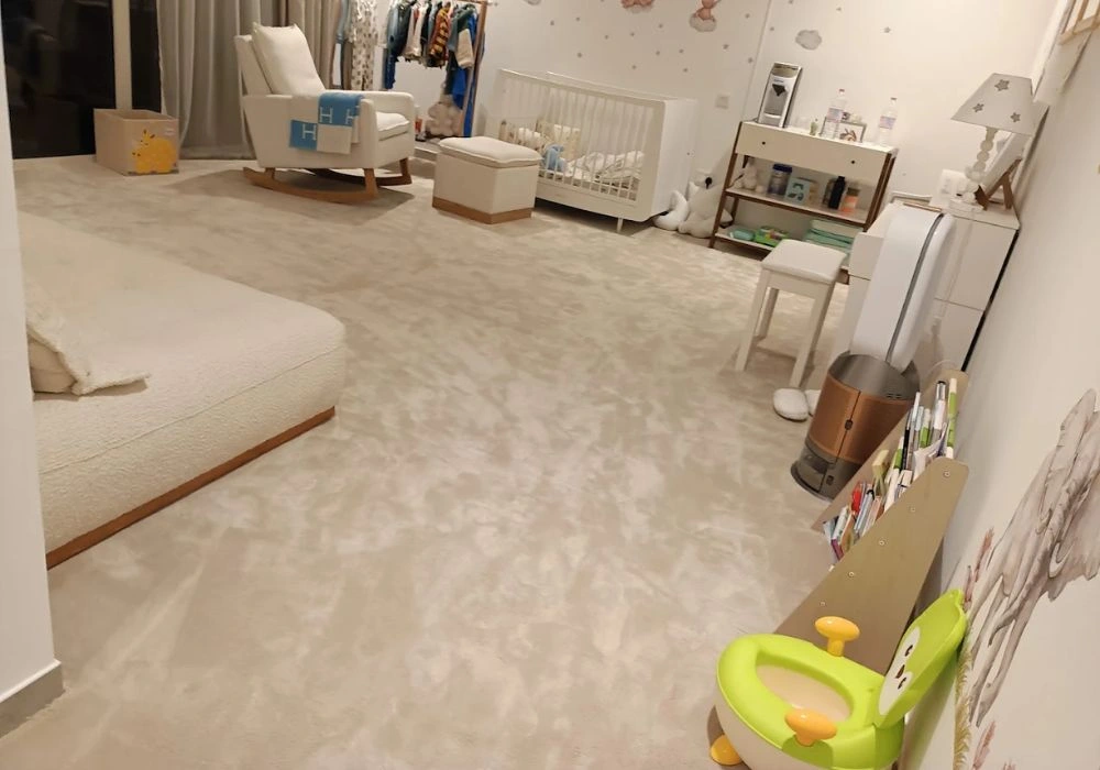 Beige wool carpet in Dubai nursery room