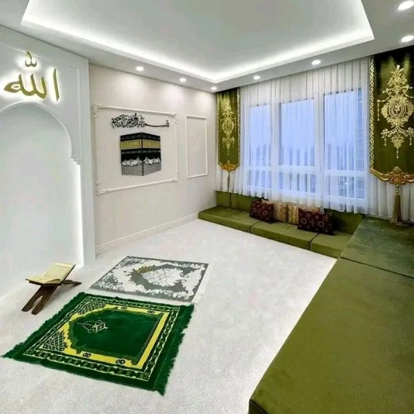 Green Islamic prayer carpet design in modern interior