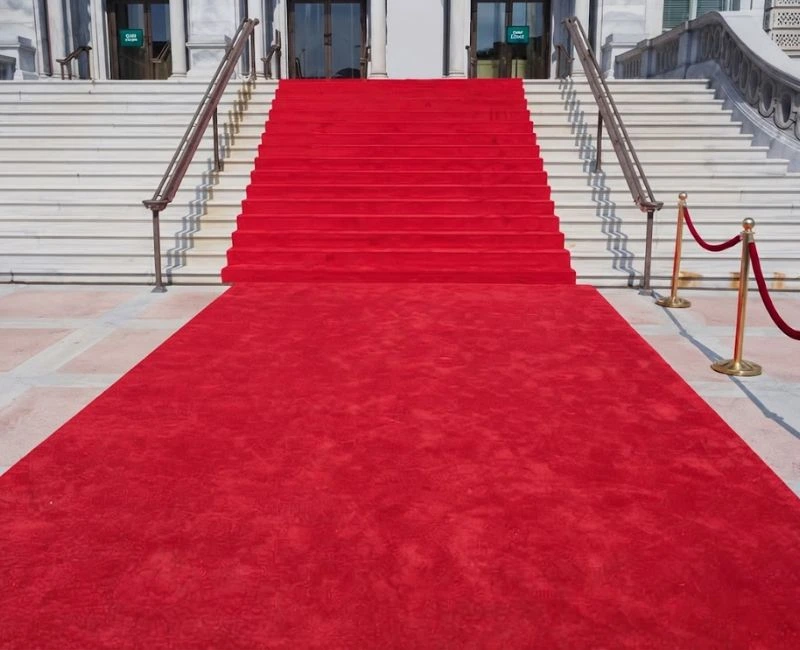 Red carpet installed on grand stairs