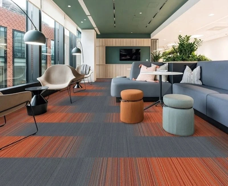 Striped modular carpet tiles for sitting area