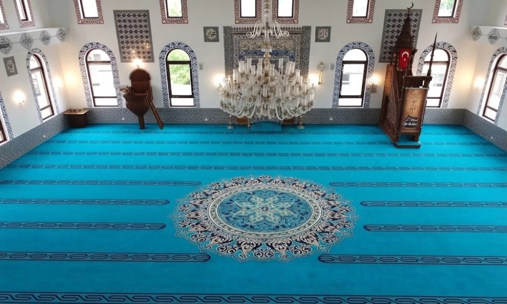Turquoise mosque carpet with center medallion design